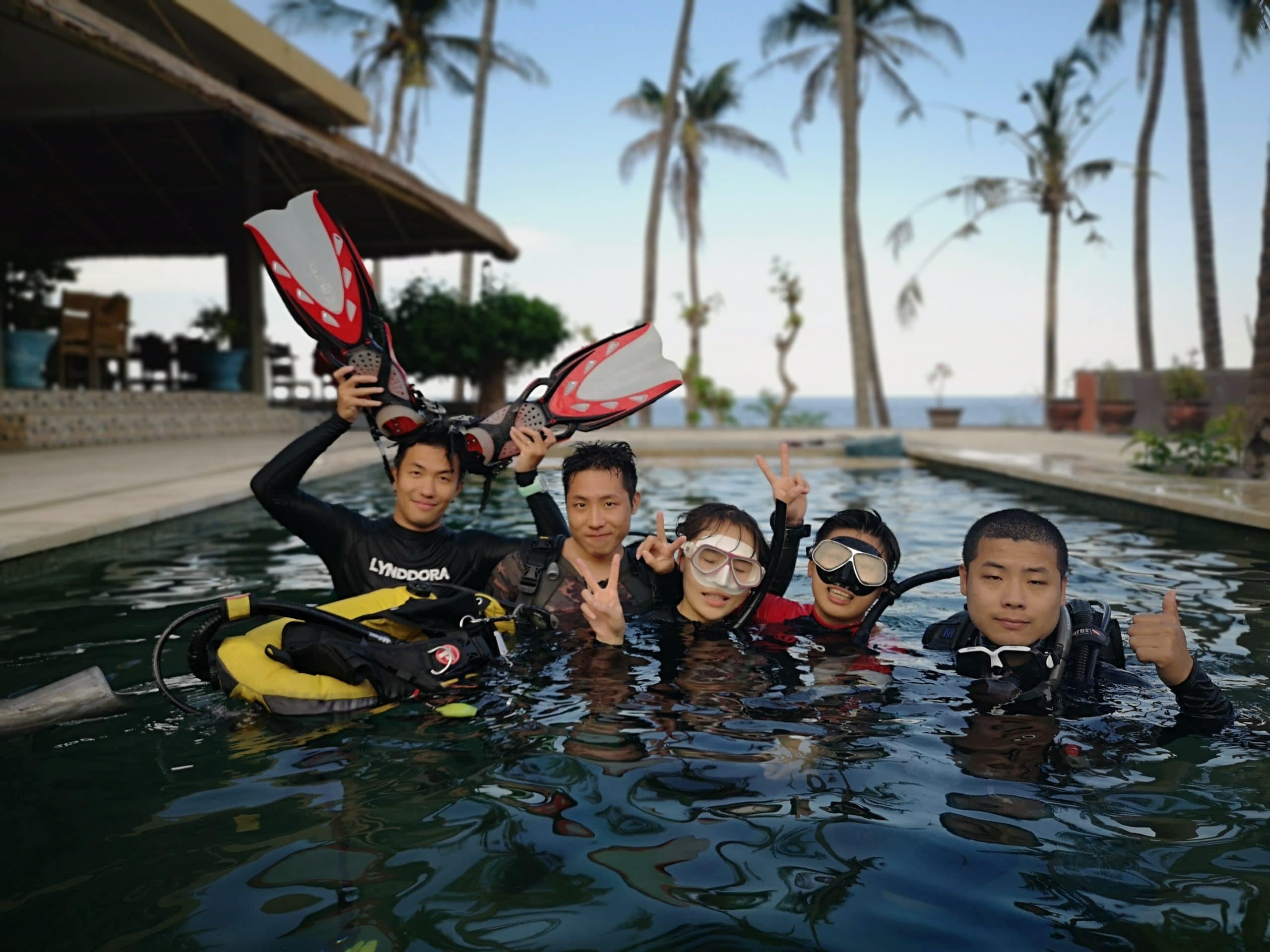 Diving taking scuba diving pool session Bali