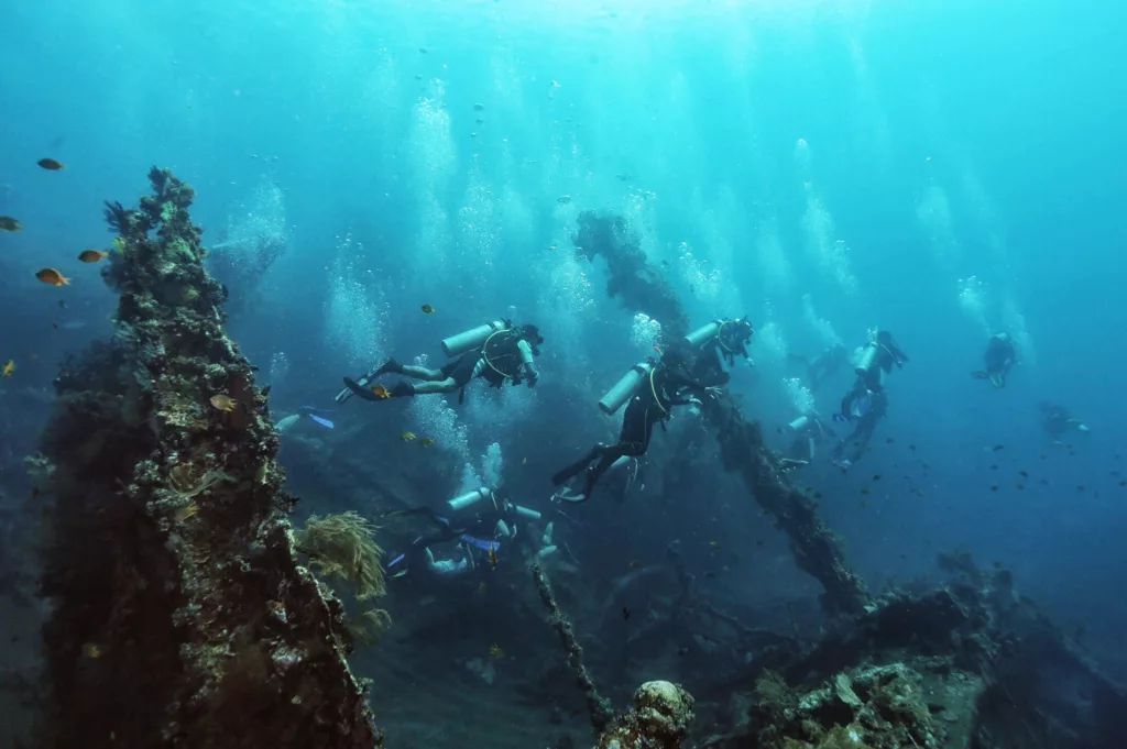 Divers at Uss Liberty Shipwreck Tulamben Bali Dive Site