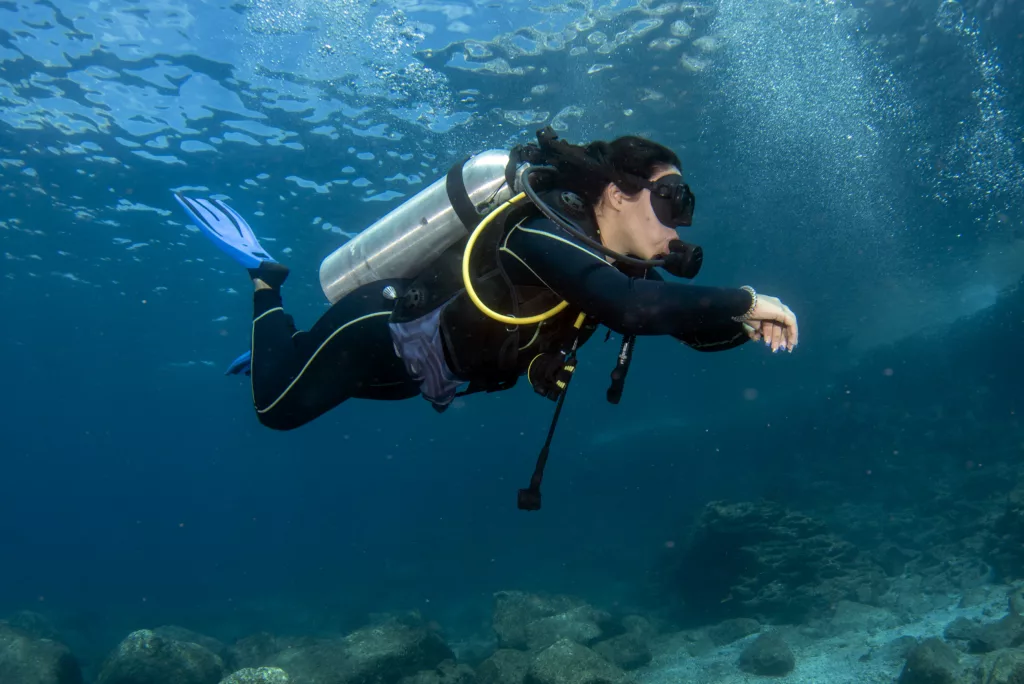 a scuba diver - Bali Dive Resort