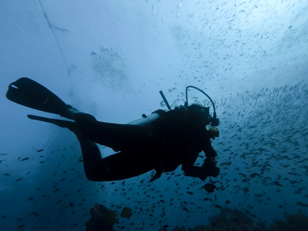 Scuba diving - diver silhouette in the reef, ko lanta island thailand