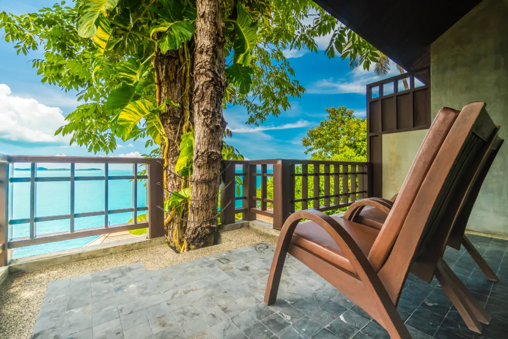 Balcony with chair around beautiful sea and ocean view for travel and vacation