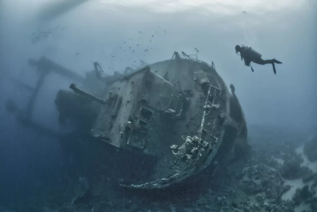 Diver exploring the shipwreck Cedar Pride in Aqaba - Bali Dive Resort