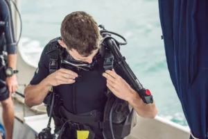 Diver Prepares His Equipment For Bali Open Water Diving